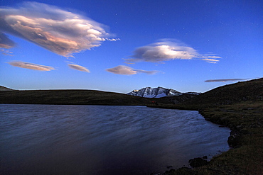 Pink clouds after sunset on Rossett Lake at an altitude of 2709 meters, Gran Paradiso National Park, Alpi Graie (Graian Alps), Italy, Europe 