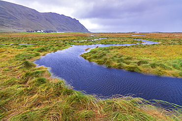 Flowing water of winding creek, Fredvang, Nordland county, Lofoten Islands, Norway, Europe