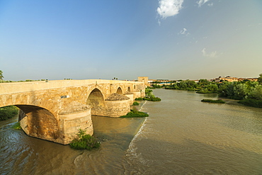 Puente Romano (Roman bridge) along Guadalquivir River at sunset, Cordoba, UNESCO World Heritage Site, Andalusia, Spain, Europe