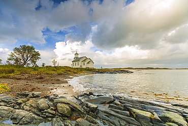 Church by beach on Gimsoya, Lofoten Islands, Norway, Europe