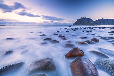 Long exposure shot of rocks on Uttakleiv beach in Vestvagoy, Norway, Europe