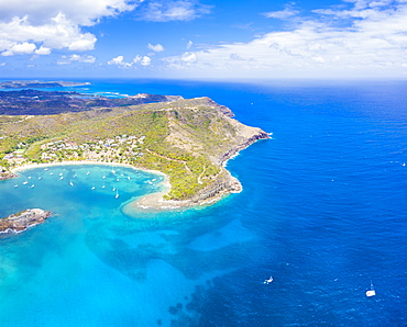 Aerial panoramic by drone of Galleon Beach and Pillar of Hercules limestone cliffs, Antigua, Antigua and Barbuda, Leeward Islands, West Indies, Caribbean, Central America