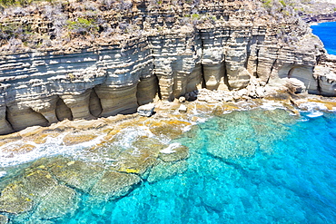 White limestone cliffs Pillar of Hercules washed by Caribbean Sea, aerial view by drone, English Harbour, Antigua, Leeward Islands, West Indies, Caribbean, Central America