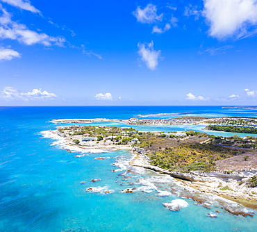 Aerial panoramic by drone of Long Bay, Devil's Bridge and The Verandah resort, Antigua, Antigua and Barbuda, Leeward Islands, West Indies, Caribbean, Central America