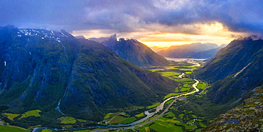 Aerial view of clouds at sunset over Romsdalen valley from Romsdalseggen ridge, Andalsnes, More og Romsdal county, Norway, Scandinavia, Europe