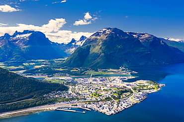 Aerial view by drone of mountains and fjord surrounding Andalsnes town, Rauma municipality, More og Romsdal county, Norway, Scandinavia, Europe