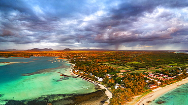 Dramatic sky at dawn over Trou d'Eau Douce coastline, aerial view, Flacq district, East coast, Mauritius, Indian Ocean, Africa