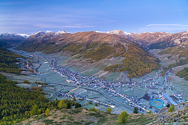 Sunrise over the village of Livigno in autumn, aerial view, Valtellina, Sondrio province, Lombardy, Italy, Europe