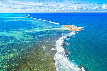 Aerial view by drone of historical island of Ile au Phare (Ile Aux Fouquets) in between coral reef and Indian Ocean, Mahebourg, Mauritius, Indian Ocean, Africa