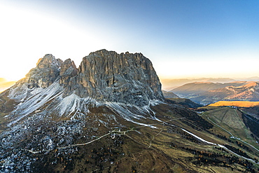 Aerial view of sunset on Sassolungo, Sassopiatto and Passo Gardena in autumn, Dolomites, South Tyrol, Italy, Europe