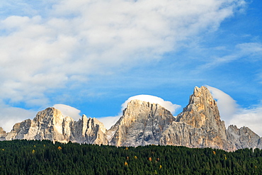 Majestic Pale di San Martino (Pala group) surrounded by woods in autumn, Rolle Pass, Dolomites, Trentino, Trento, Italy, Europe