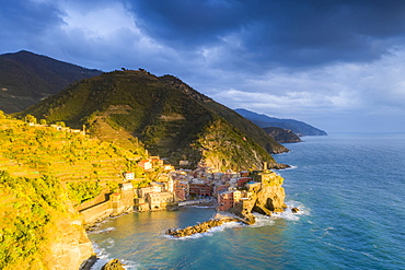 Aerial view of clouds at sunset over the coastal village of Vernazza, Cinque Terre, UNESCO World Heritage Site, La Spezia province, Liguria, Italy, Europe