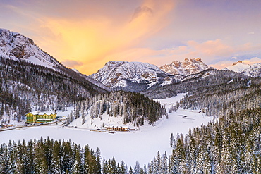 View by drone of sunset over Monte Piana and woods covered with snow, Misurina, Dolomites, Belluno province, Veneto, Italy, Europe