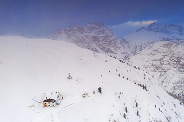 View by drone of Rifugio Bosi hut on top of Monte Piana covered with snow, Dolomites, Auronzo di Cadore, Belluno, Veneto, Italy, Europe