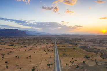 Empty road across the arid landscape, aerial view by drone, Gheralta Mountains, Hawzen, Tigray Region, Ethiopia, Africa