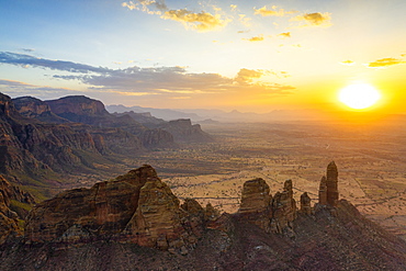 Aerial view by drone of Gheralta Mountains and valley lit by sunset, Hawzen, Tigray Region, Ethiopia, Africa