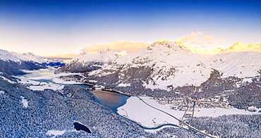 Aerial view by drone of Lej Da Champfer, Silvaplana, snowy Piz Da La Margna and Piz Polaschin, Engadine, canton of Graubunden, Switzerland, Europe