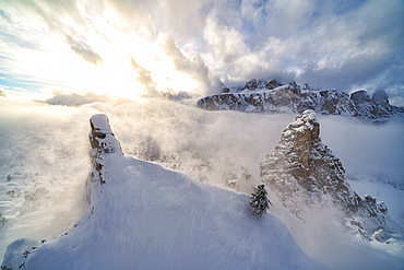 Aerial view of Sella covered with snow from Cir group, Puez-Odle Nature Park, Gardena Pass, Dolomites, South Tyrol, Italy, Europe