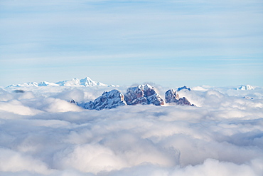 Aerial view of Monte Cristallo and Pomagagnon peaks emerging from clouds, Dolomites, Belluno province, Veneto, Italy, Europe