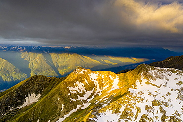 Sunrise over Orobie Alps from Sasso Bianco, aerial view, Valmalenco, Sondrio province, Valtellina, Lombardy, Italy, Europe