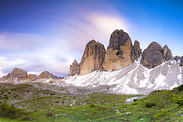 Sunset over Tre Cime di Lavaredo, Monte Paterno and Grava Longa lakes in summer, Sesto Dolomites Natural Park, South Tyrol, Italy, Europe