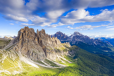 Clouds over Cima Ambrizzola, Tofane and Federa Lake surrounded by woods, Dolomites, Cortina d'Ampezzo, Veneto, Italy, Europe