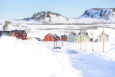 Empty snowy road to Veines village, Kongsfjord, Varanger Peninsula, Troms og Finnmark, Norway, Scandinavia, Europe