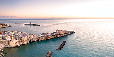 Aerial view of old town and lighthouse of Vieste at dawn, Foggia province, Gargano National Park, Apulia, Italy, Europe