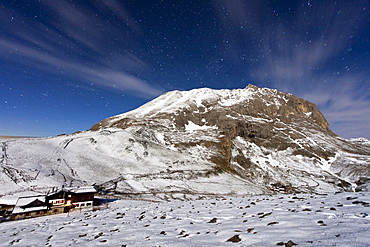 The mountain hut at the foot of Plattkofel (Sasso Piatto) under a starry winter night, South Tyrol, Trentino-Alto Adige, Italy, Europe