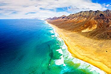 Aerial panoramic of mountains and Cofete Beach in Jandia Natural Park, Fuerteventura, Canary Islands, Spain, Atlantic, Europe