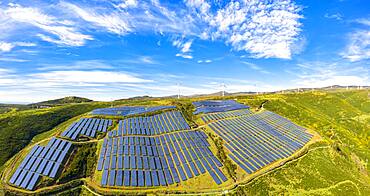 Solar panels and wind turbines on the green plateau, Encumeada, Madeira island, Portugal, Atlantic, Europe