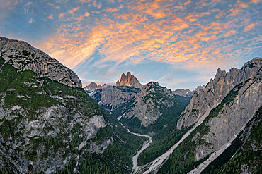 Sunset over Tre Cime di Lavaredo and woods, aerial view, Sesto (Sexten) Dolomites, Bolzano province, Trentino Alto Adige, Italy, Europe