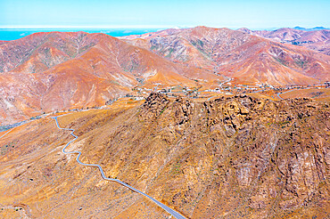 Aerial view of desert road in the barren landscape, Mirador del Risco de las Penas, Pajara, Fuerteventura, Canary Islands, Spain, Atlantic, Europe