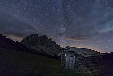 The Milky Way in the starry sky above the Odle, Funes Valley, South Tyrol, Dolomites, Italy, Europe