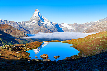 Sunrise over majestic Matterhorn from Stellisee lake, Zermatt, Valais Canton, Swiss Alps, Switzerland, Europe