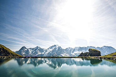 Eiger, Monch and Jungfrau peaks reflected in the unspoiled Engital lake, Murren Birg, Jungfrau Region, Bern Canton, Swiss Alps, Switzerland, Europe