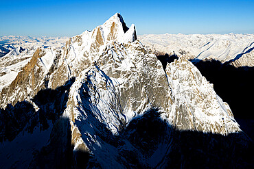 Aerial view of Pizzo Cengalo mountain peak covered with snow, Val Masino, Valtellina, Sondrio province, Lombardy, Italy, Europe