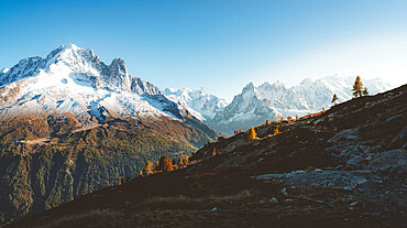 Autumn mist over Aiguille Verte, Dent du Geant, Aiguilles du Chamonix and Mont Blanc covered with snow, Haute Savoie, French Alps, France, Europe