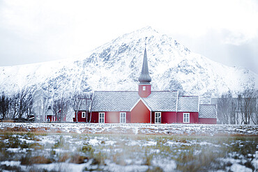 Red church of Flakstad in winter fog, Flakstad, Nordland county, Lofoten Islands, Norway, Scandinavia, Europe