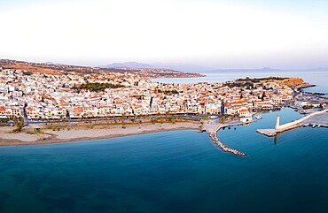 Aerial panoramic view of the old Venetian harbor and medieval town of Rethymno at sunrise, Crete island, Greek Islands, Greece, Europe