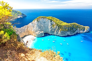 Turquoise sea washing the white sand of Navagio Beach (Shipwreck Beach) view from clifftop, Zakynthos island, Greek Islands, Greece, Europe