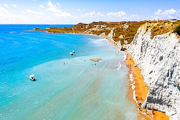 Aerial view of majestic limestone cliffs framing the golden sand of Xi beach, Kefalonia, Ionian Islands, Greek Islands, Greece, Europe