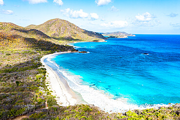 Overhead view of the crystal turquoise sea surrounding the idyllic Rendezvous Beach, Antigua, West Indies, Caribbean, Central America