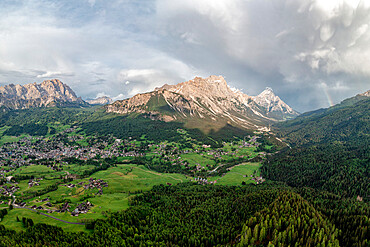 Clouds over Monte Cristallo, Sorapiss, Antelao mountains and woods in spring, Cortina D'Ampezzo, Dolomites, Veneto, Italy, Europe