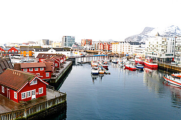 Foggy sky over the fishing village and harbor of Svolvaer, Nordland county, Lofoten Islands, Norway, Scandinavia, Europe