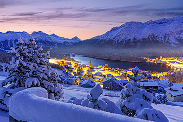 Fairy tale view of Saint Moritz on a snowy winter dusk, Graubunden canton, Engadin, Switzerland