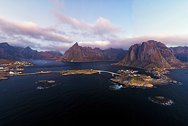 Aerial view of mountains and sea surrounding the fishing village of Hamnoy, Reine, Lofoten Islands, Nordland, Norway, Scandinavia, Europe