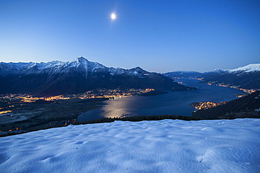 Lake Como and its many villages under a full moon, Lombardy, Italy, Europe