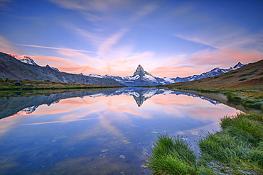 The Matterhorn reflected in Lake Stellisee at dawn, Zermatt, Canton of Valais, Pennine Alps, Swiss Alps, Switzerland, Europe