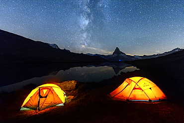 Camping under the stars with Matterhorn reflected in Lake Stellisee, Zermatt, Canton of Valais, Pennine Alps, Swiss Alps, Switzerland, Europe